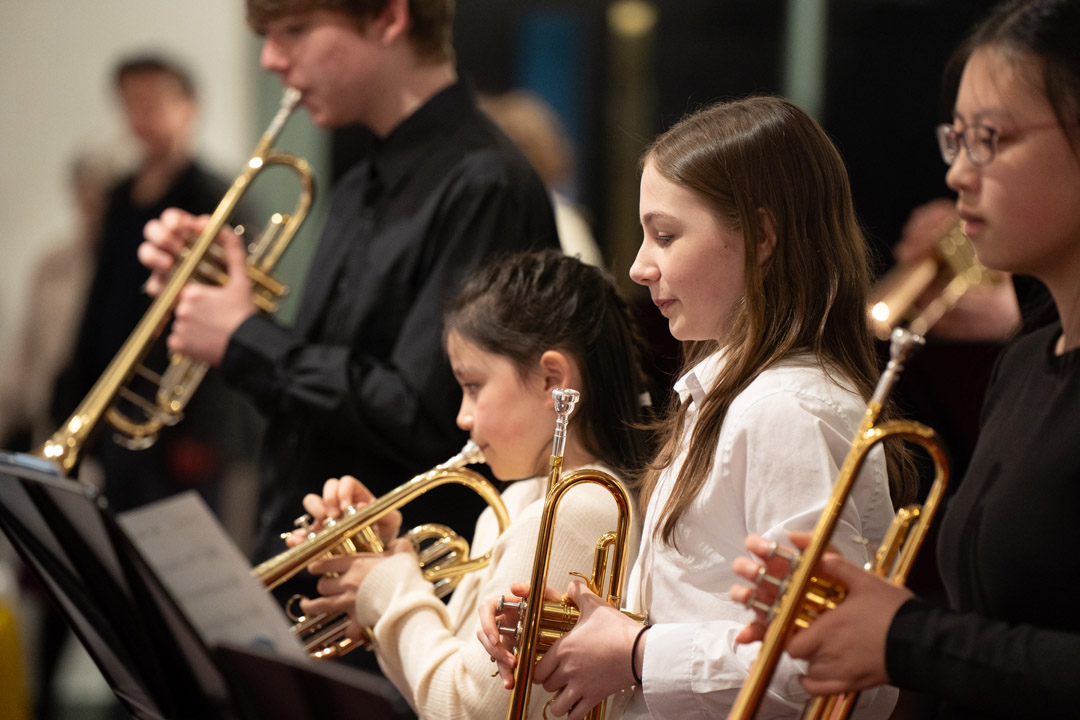 Children playing brass instruments